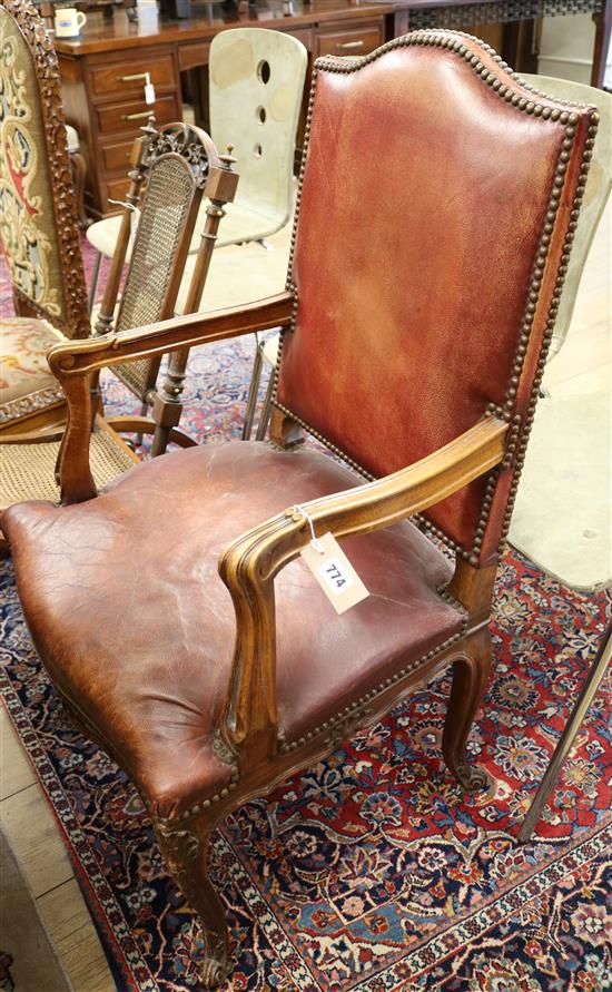 A leather seated French elbow chair